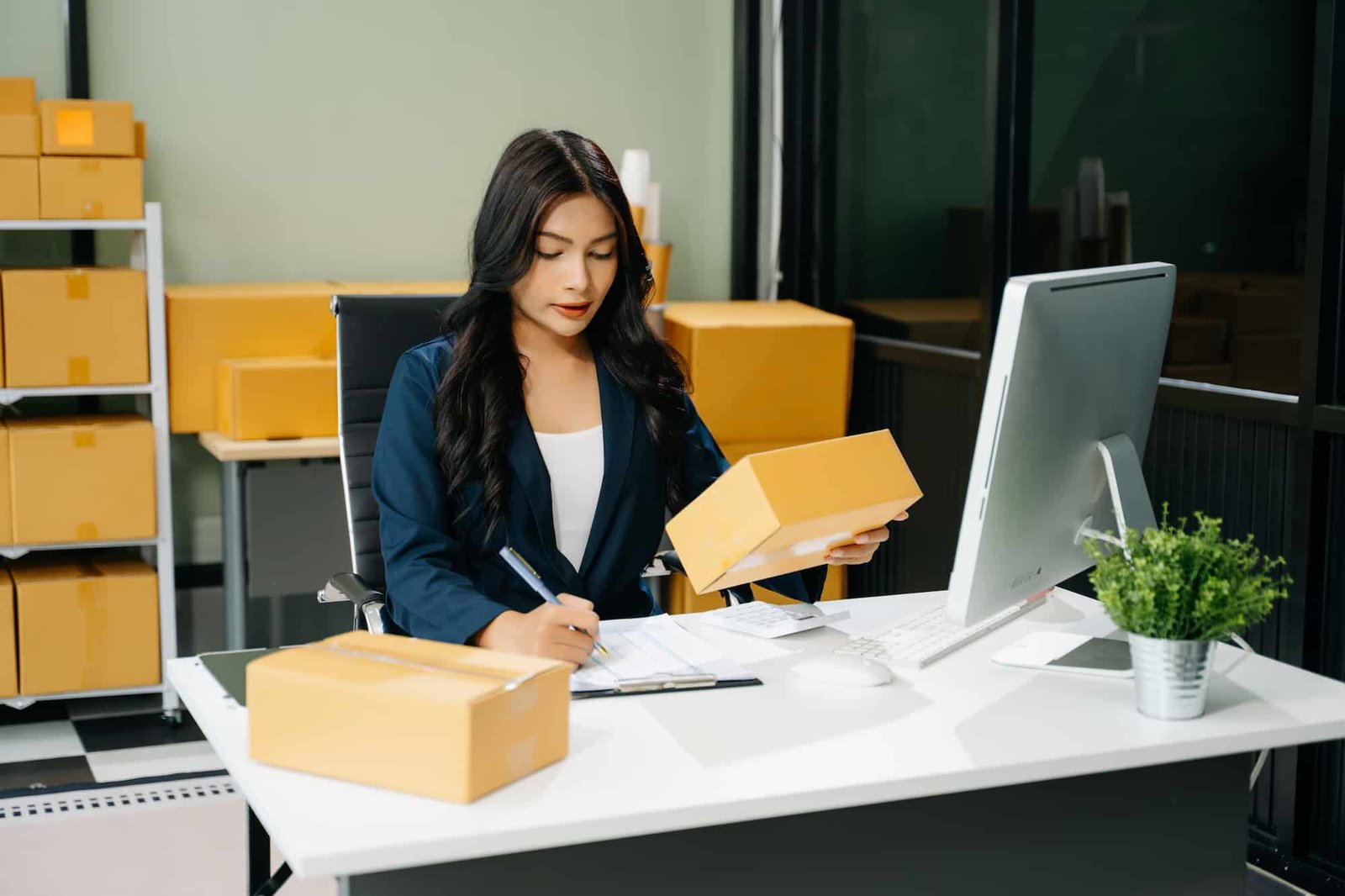 Partner managing orders at desk